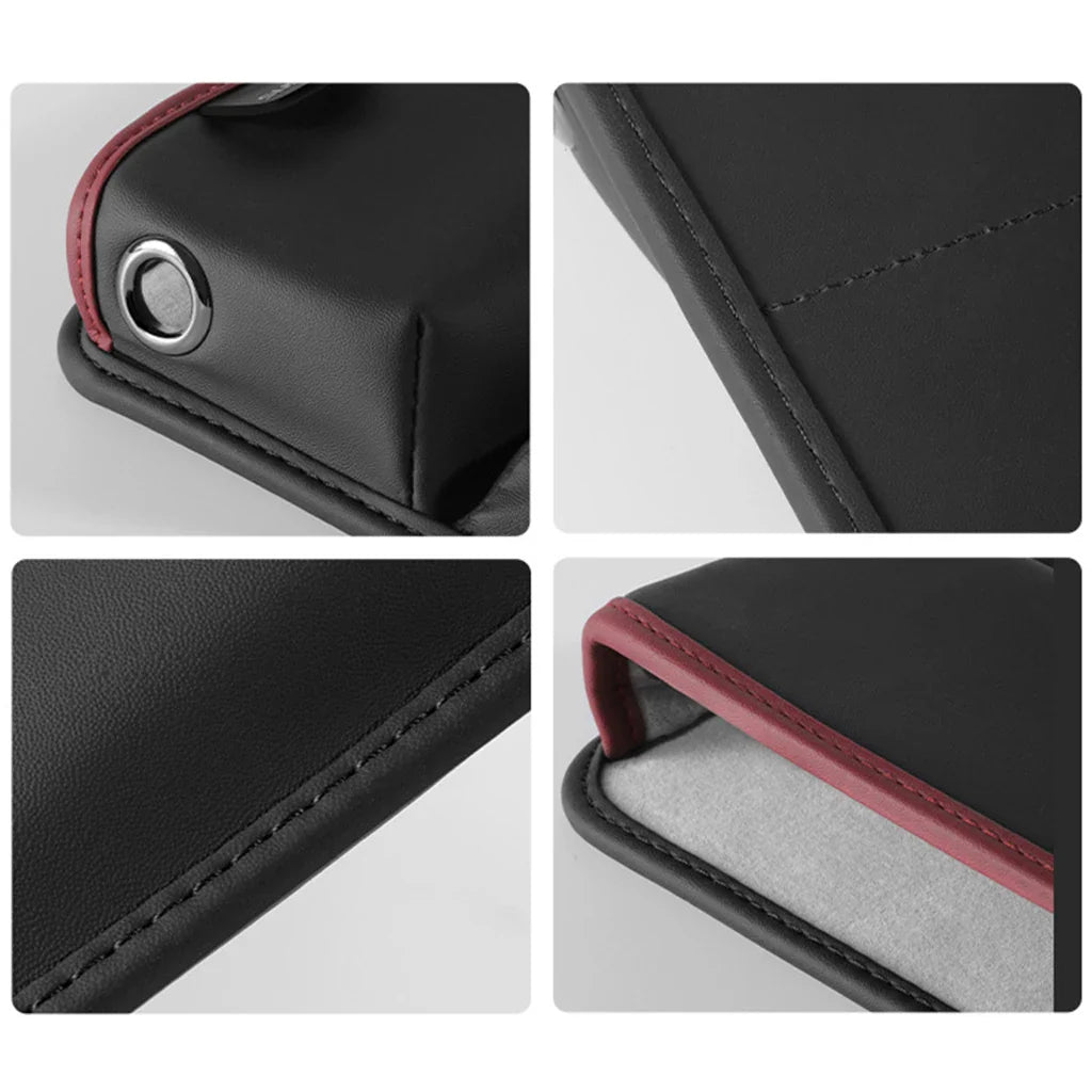 the back of a black leather case with red stitching