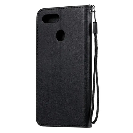 The back of a black leather iphone case