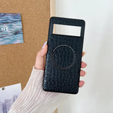 Black leather phone case with a textured crocodile pattern and a small window.