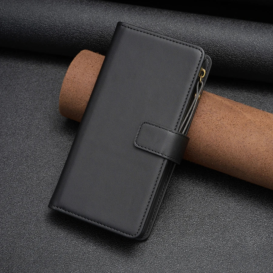 a black leather wallet case with a gold zipper