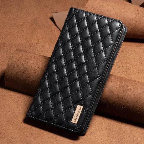 the black leather wallet case is shown on a brown background