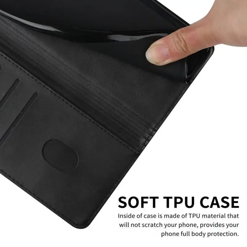 the black leather wallet case is open and showing the card slot