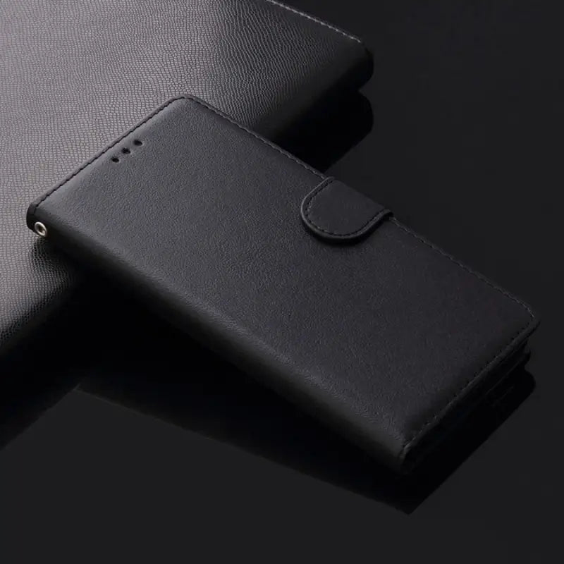 the back of a black leather wallet case