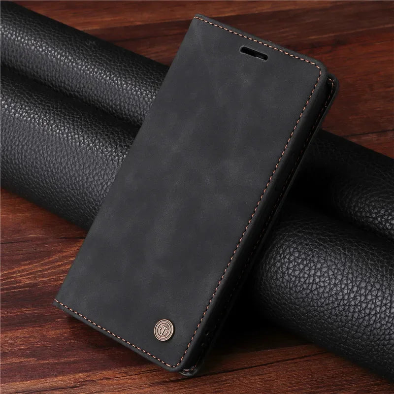 Black leather wallet-style phone case with a circular logo emblem.