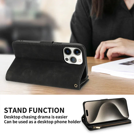 Black leather wallet-style phone case with a stand function for an iPhone.