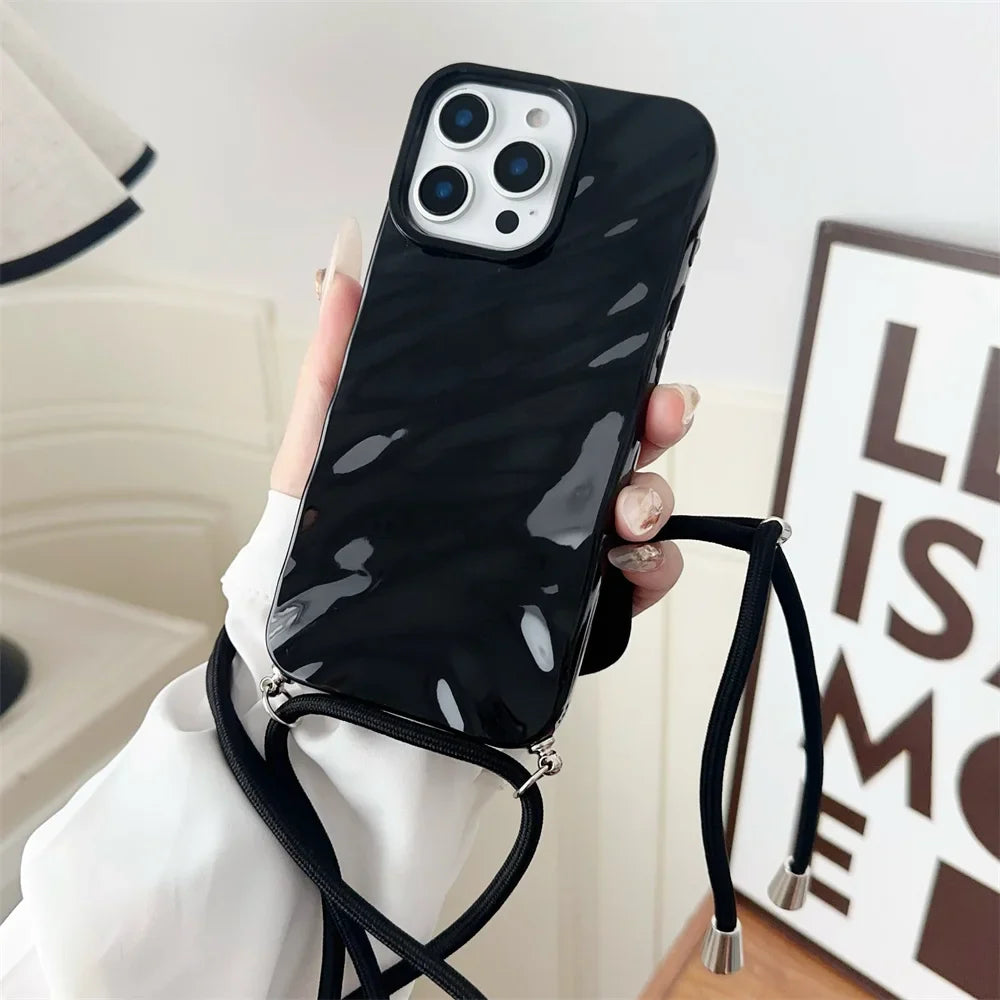 Black marble-patterned phone case with lanyard.