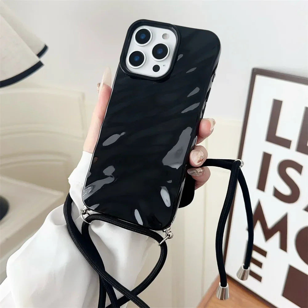 Black marble-patterned phone case with lanyard.