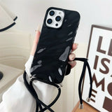 Black marble-patterned phone case with lanyard.