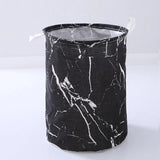 a black and white marble bucket with a white handle