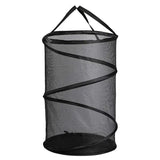 a black mesh hanging basket with handles and straps