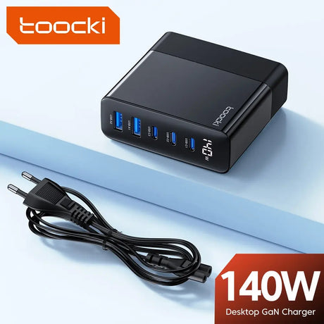 Black multi-port USB charger with five blue-lit USB ports and a digital display.