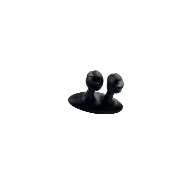 a black plastic object on a white background