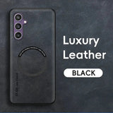 The back of a black oneplar phone with the text, ` ` ` ’