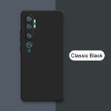 the back of a black oneplar phone with the text classic black