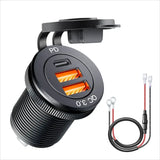 A black and orange car charger with a cable