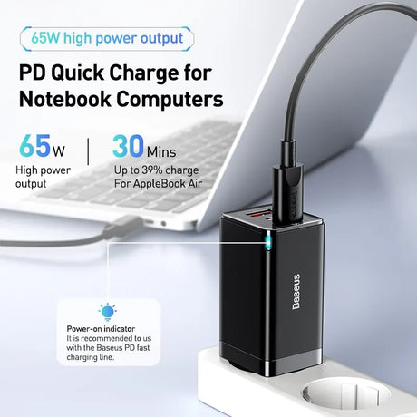 Black PD quick charger for notebook computers with 65W high power output.