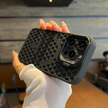 Black perforated smartphone case with a triple-camera setup.