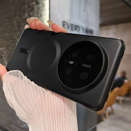 Black phone case with circular camera module.