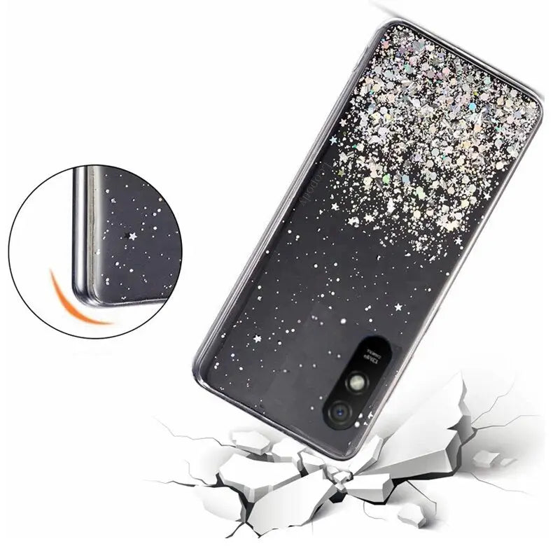 a black phone case with glitter and a hole in the middle