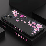 a black phone case with pink flowers on it