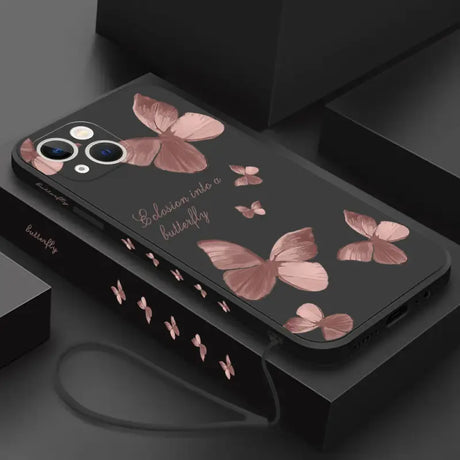 A black phone case with pink flowers on it