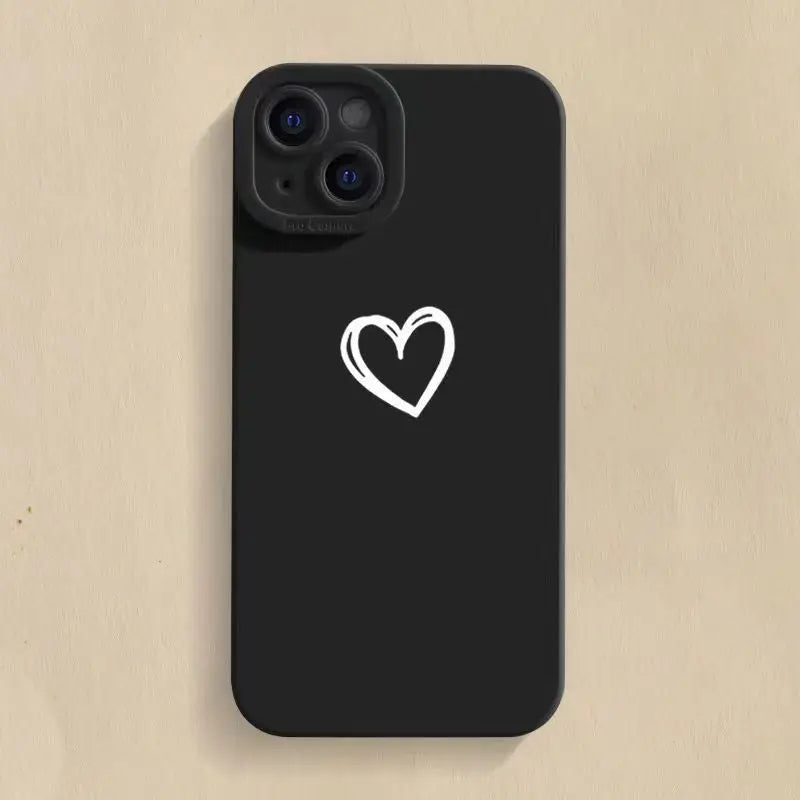 a black phone case with a white heart on it