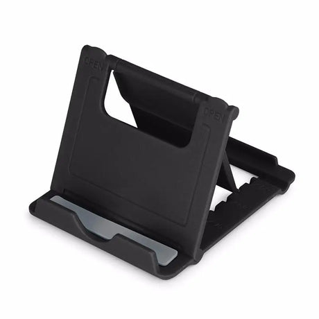 a black phone holder with a white background