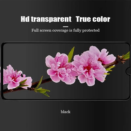 a black phone with pink flowers on it