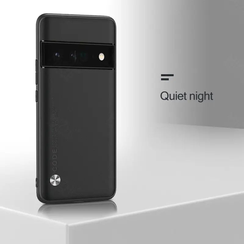 the back of a black phone with the text quiet night