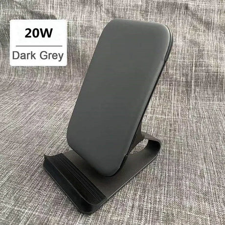 the black phone stand with a black phone on it