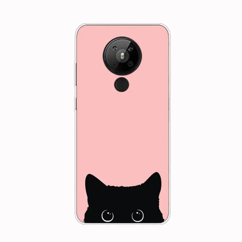 a black cat on a pink background