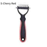 a black and pink hair brush with a white background