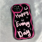 a black and pink phone case with the words happy day