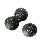 two black and pink spec dots on a white background