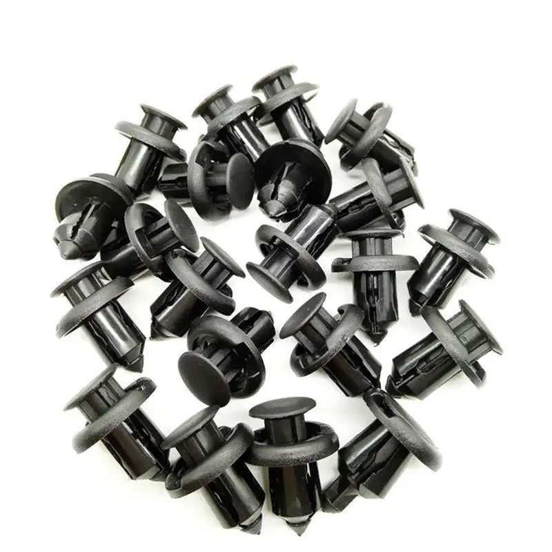 a pile of black plastic pipe fittings