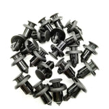a pile of black plastic pipe fittings