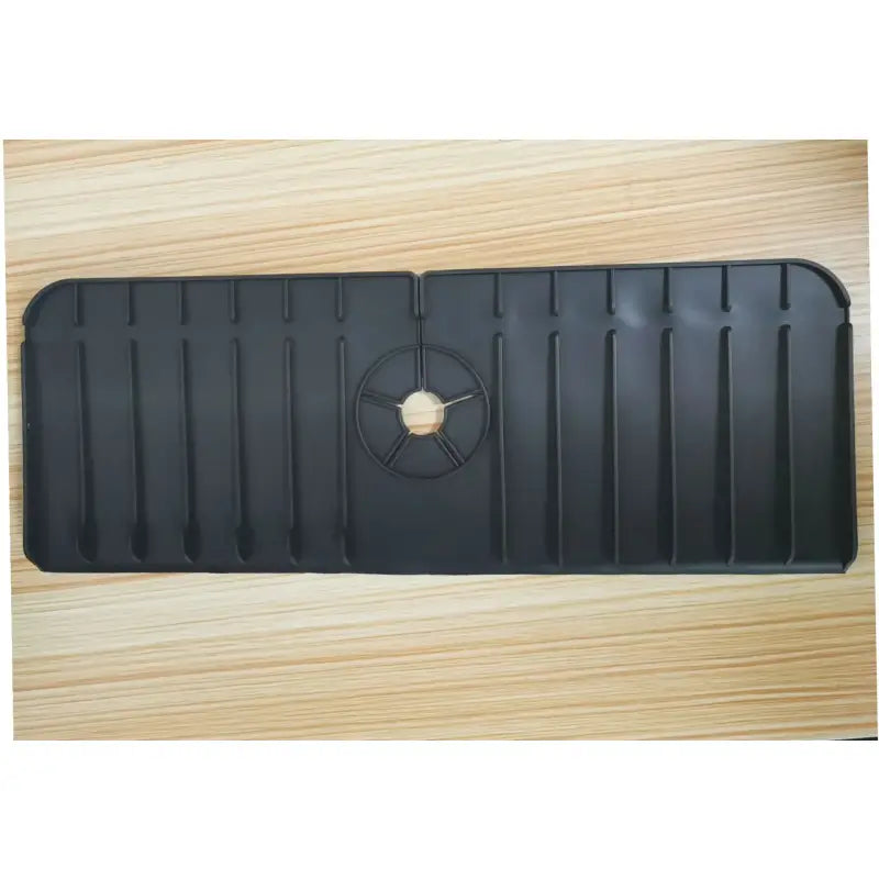 a black plastic tray with a clock on it