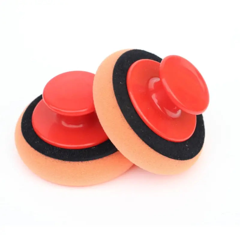 two red and black ear pads with black backing