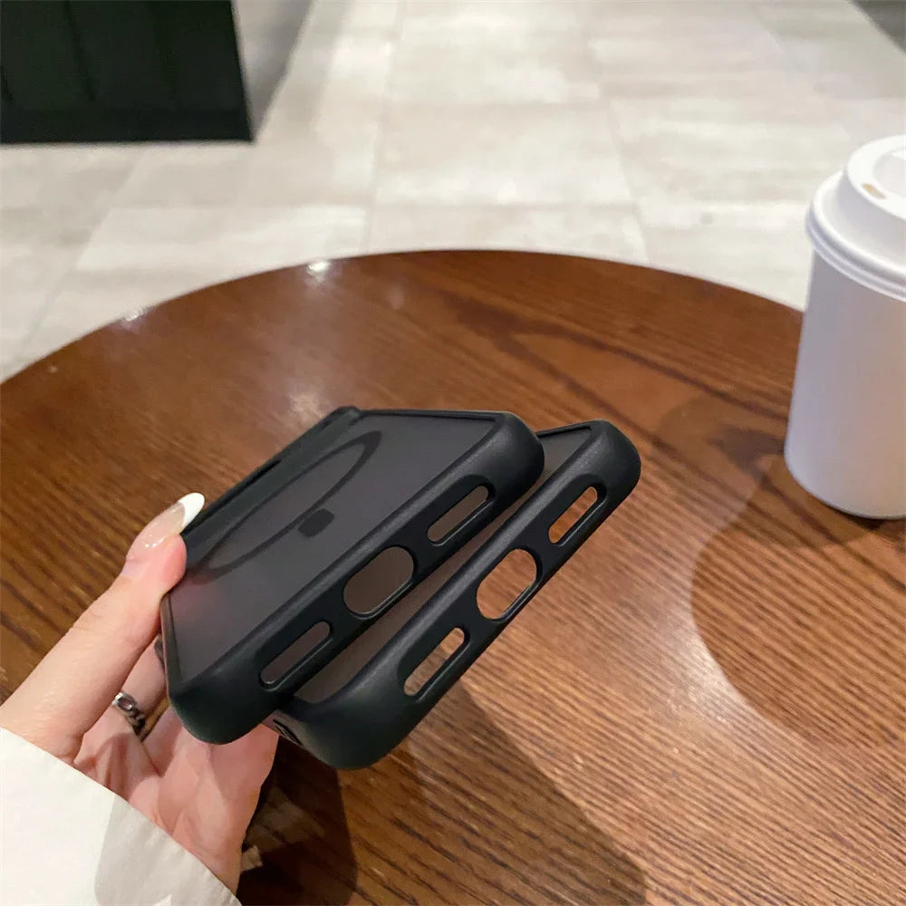 Black protective phone case with a built-in stand or grip feature.