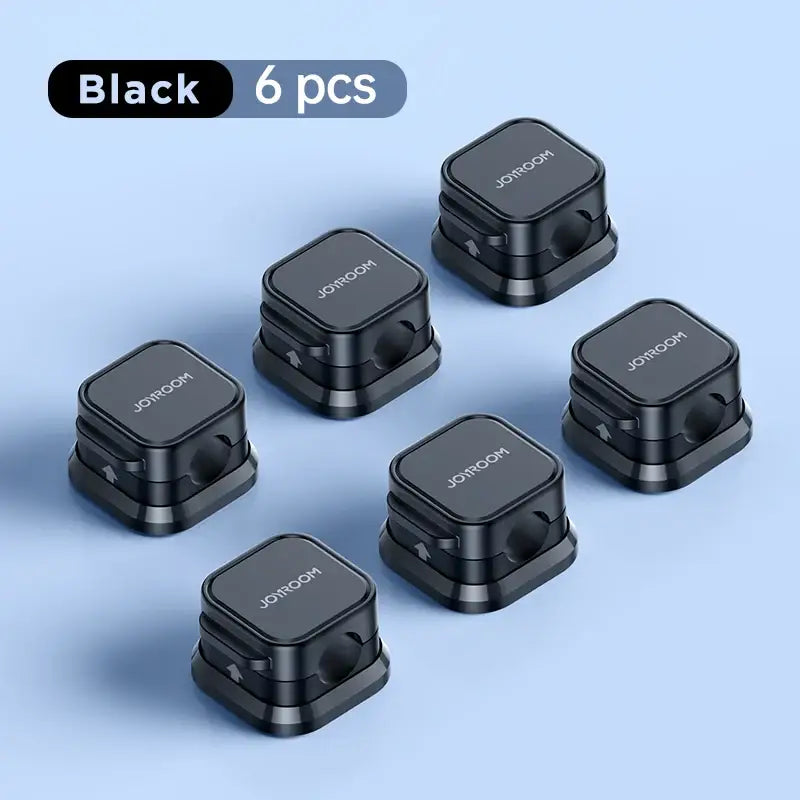 the black qcs wireless earphones are shown in a row