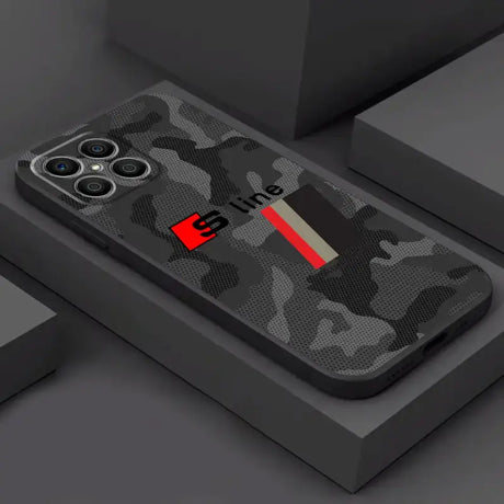 The back of a black and red camouflage iphone case