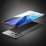 the back of a black and red oneplus phone with a black background