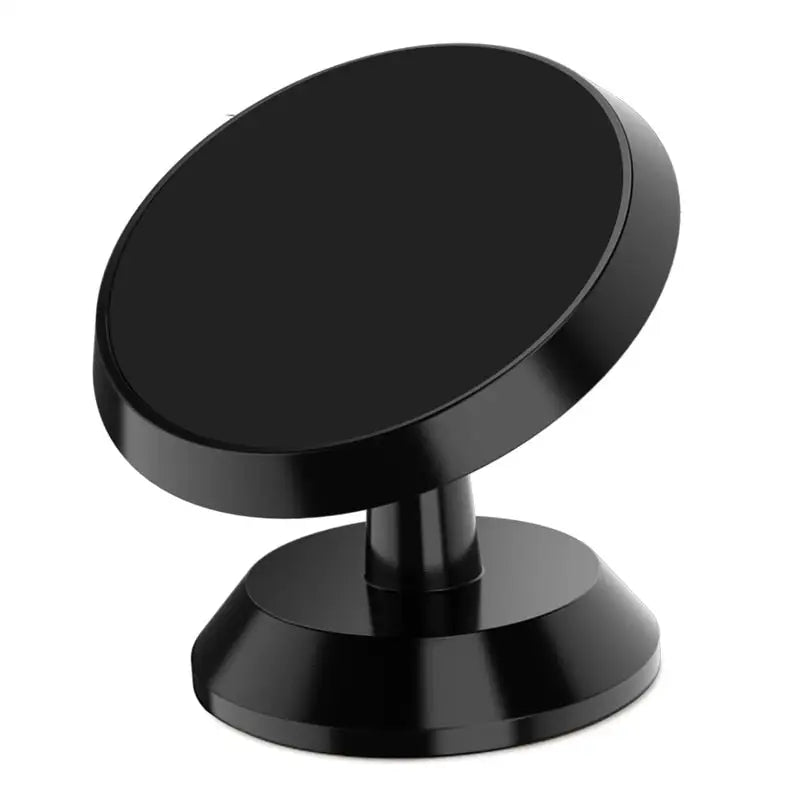 a black round mirror on a white background