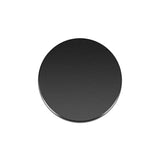 a black circular object on a white background