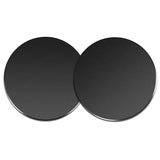two black round plates with a white background