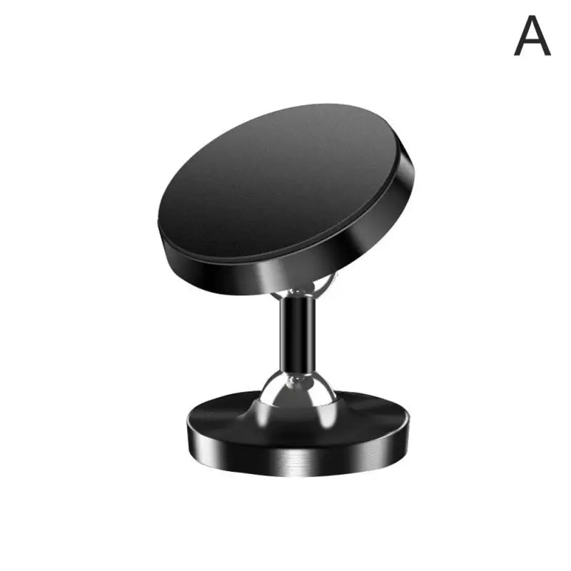 a black round table top with a metal base