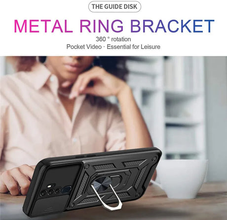 Black rugged metal magnetic ring stand with textured grip and 360-degree rotation on shockproof armor case back