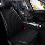the interior of a car with black leather seats