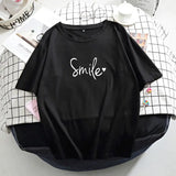 a black t shirt with the word smile on it