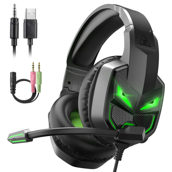 Black and silver gaming headset with glowing green led lights forming a menacing face design on the earcups.
